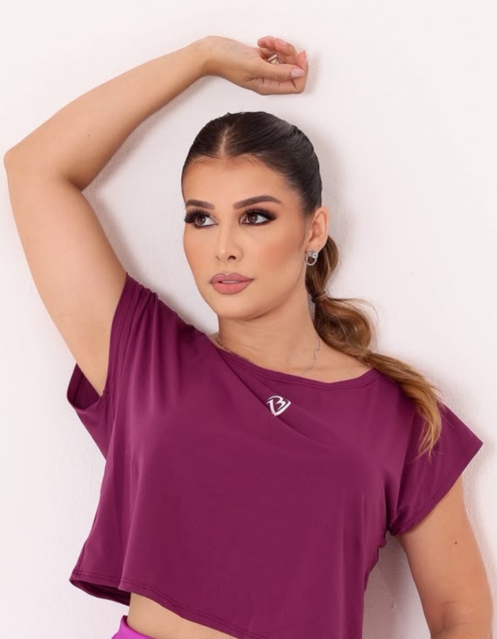 Blusa com prendedor nas costas
