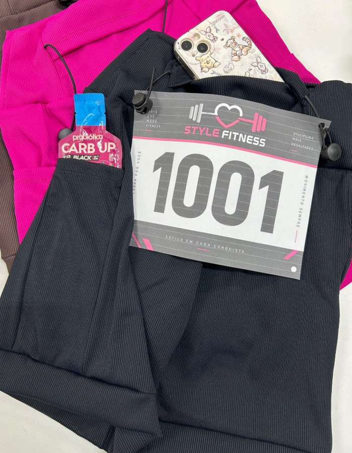 SHORT RUNNING BOLSO NO CÓS COM PORTA-NÚMERO EM CANELADO