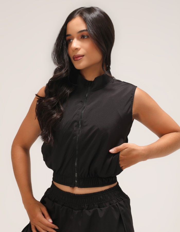 COLETE COM BOLSO 