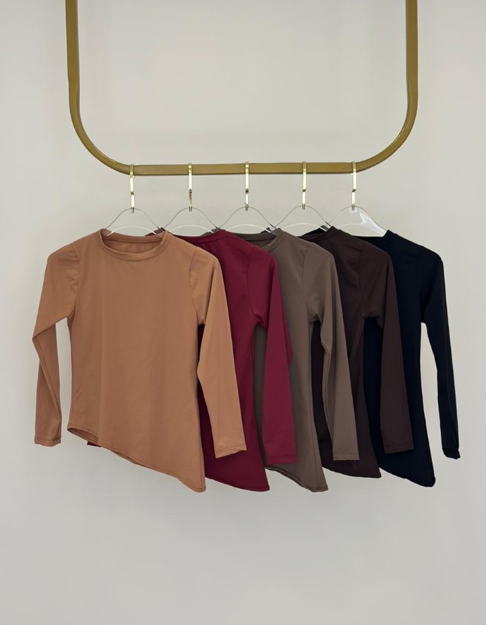 BLUSA MANGA LONGA ASSIMETRICA